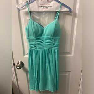 Seafoam Green colored dress with belt from Macys 
size small, worn once